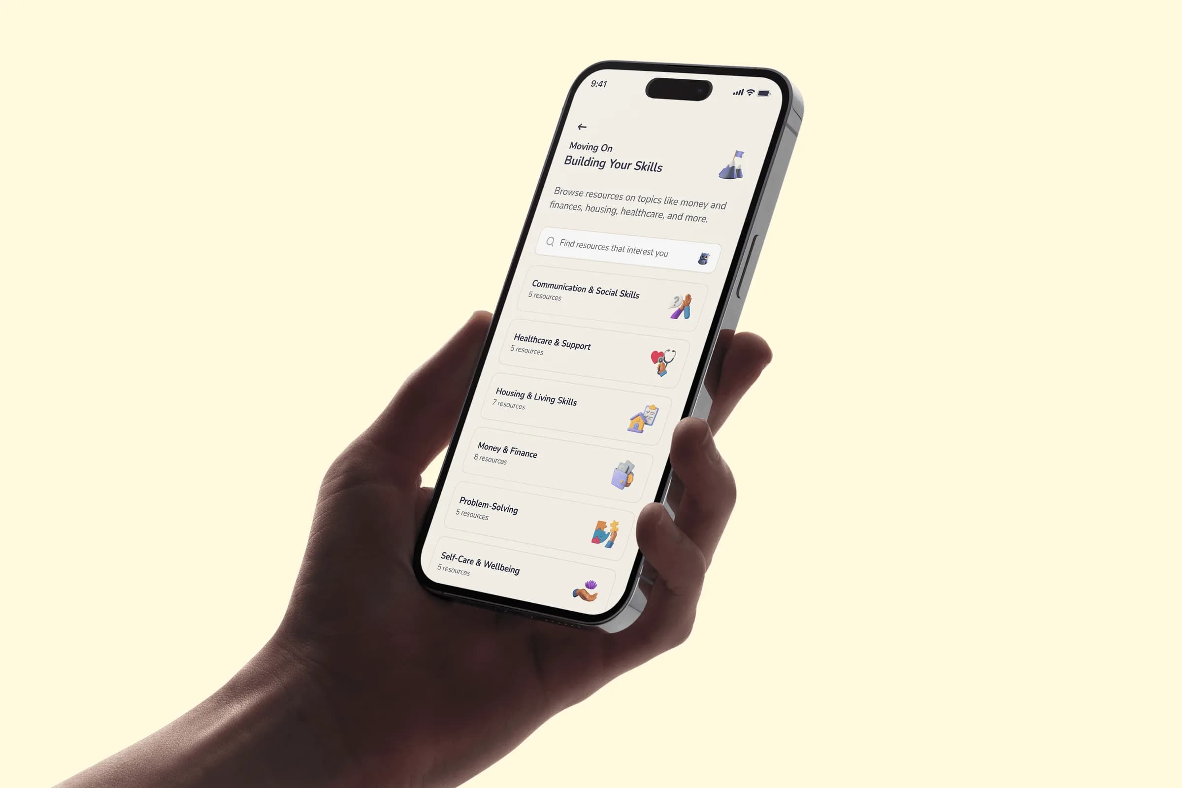 Hand holding a phone showing the KeyTu Building Your Skills screen