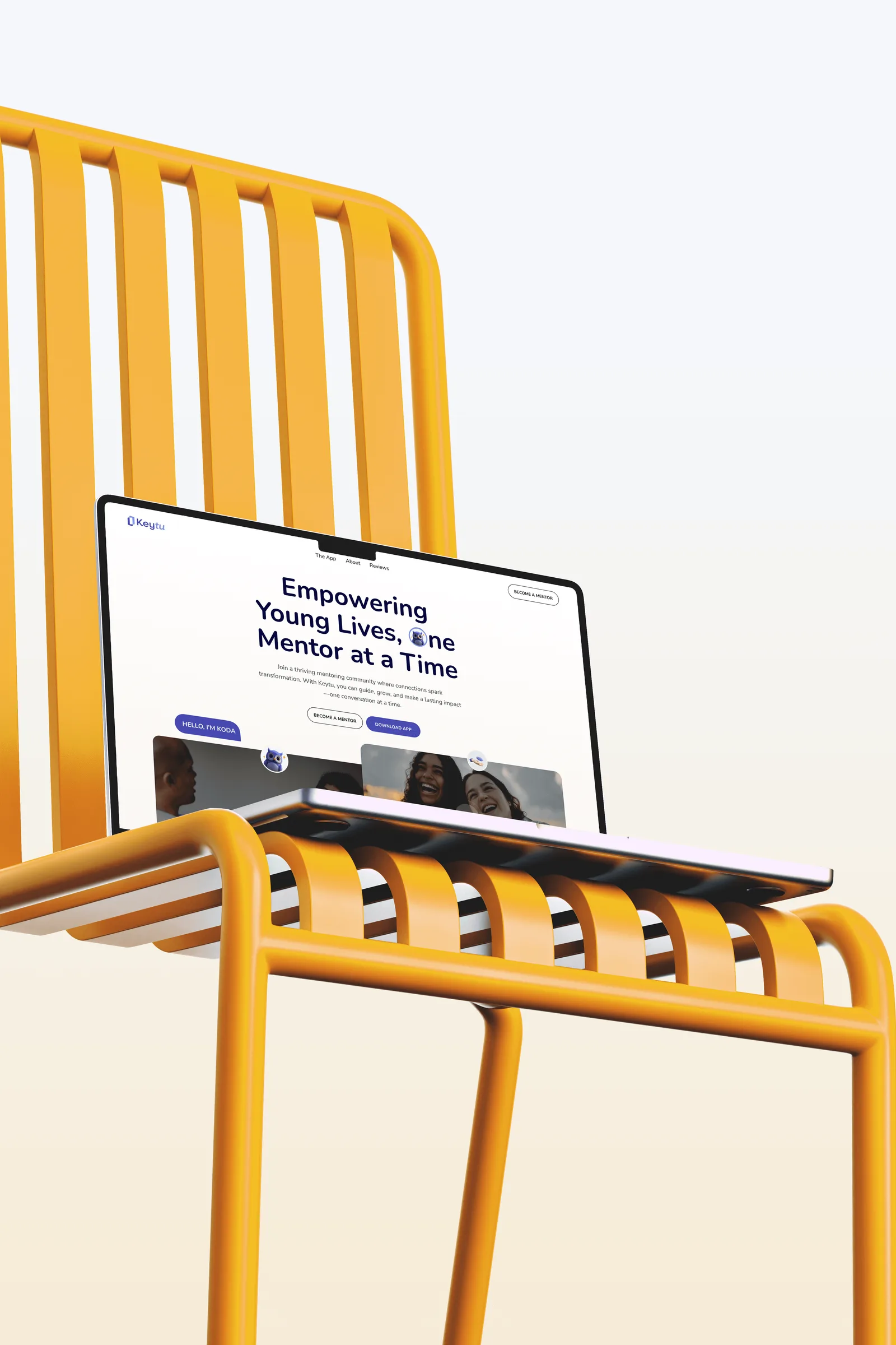 KeyTu website on a laptop resting on a yellow chair, headline reading Empowering Young Lives, One Mentor at a Time