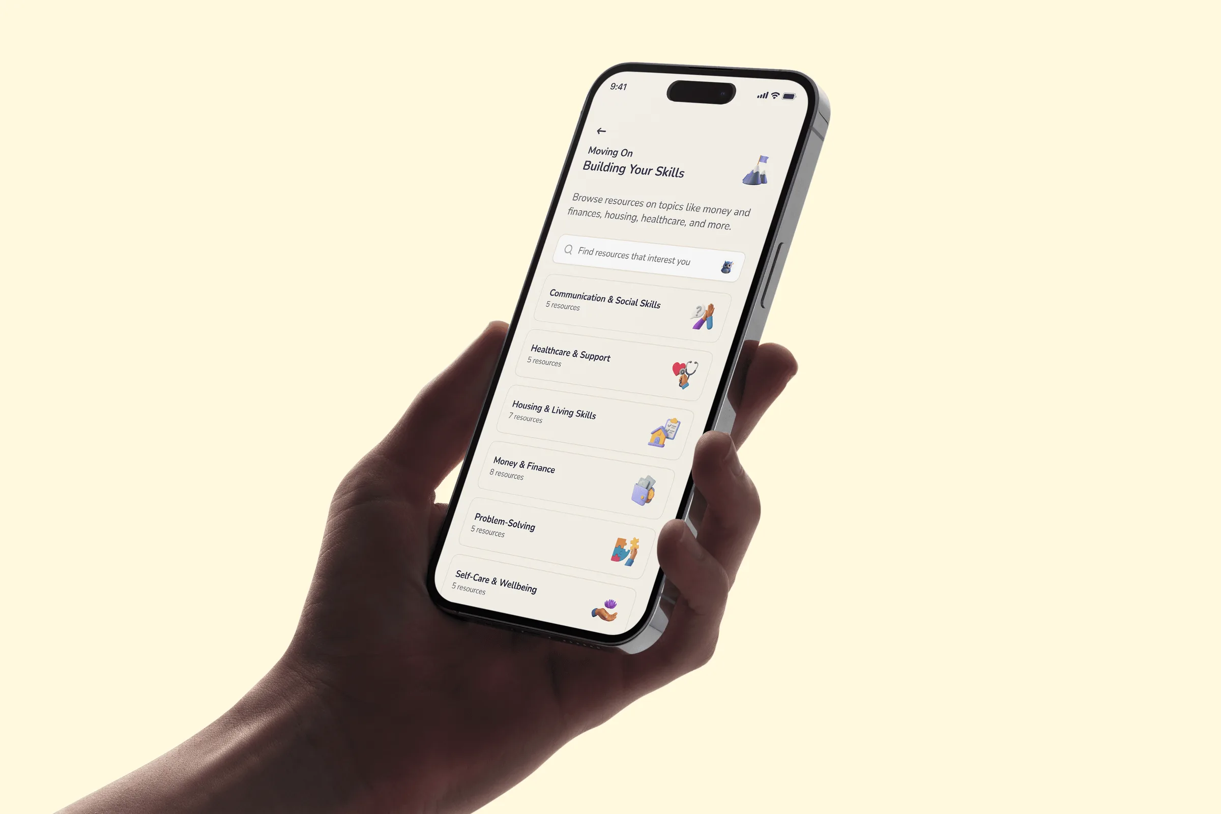 Hand holding a phone showing the KeyTu Building Your Skills screen